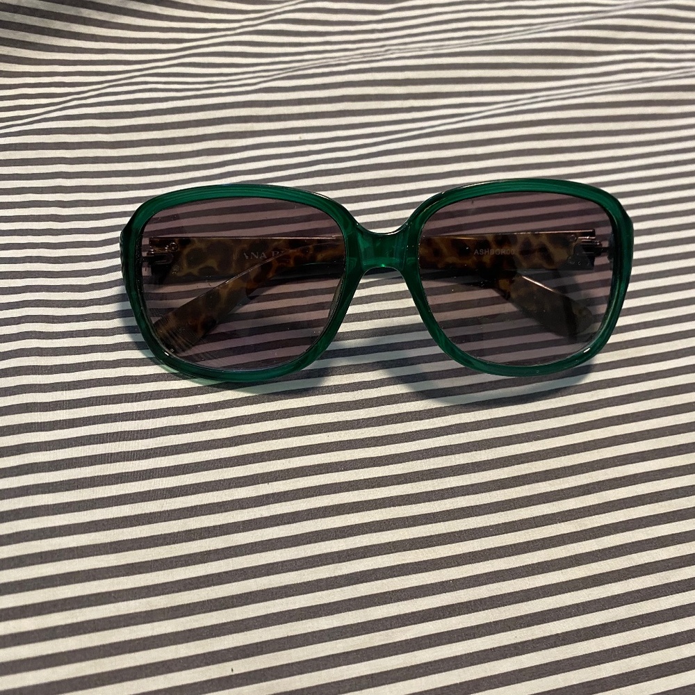 Green frame sunglasses